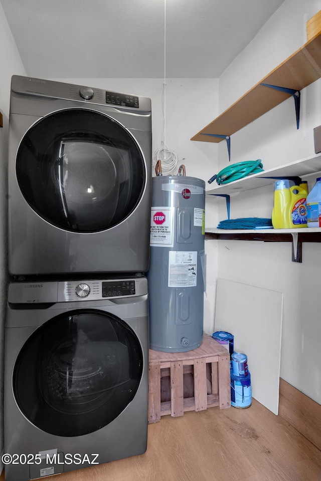 2172 N Pantano Rd Unit 217, Tucson, AZ 85715 - laundry room with stacked washer / drying machine, water heater, and wood finished floors