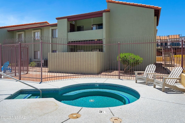 2172 N Pantano Rd Unit 217, Tucson, AZ 85715 - view of swimming pool featuring a hot tub and a patio