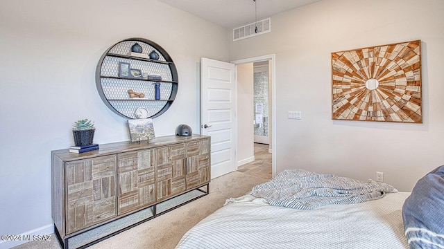 carpeted bedroom with visible vents
