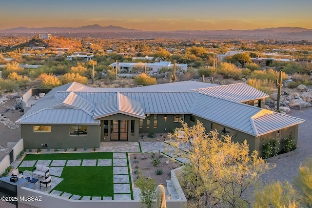 6800 N Cocopas Rd, Tucson, AZ 85718 - rear view of house featuring metal roof, a standing seam roof, and a mountain view