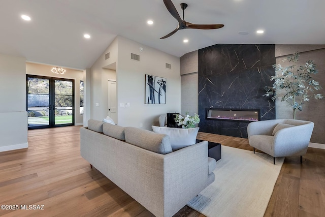 6800 N Cocopas Rd, Tucson, AZ 85718 - living room featuring lofted ceiling, baseboards, wood finished floors, recessed lighting, and ceiling fan