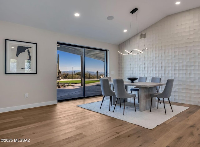 6800 N Cocopas Rd, Tucson, AZ 85718 - dining room with vaulted ceiling, a chandelier, wood finished floors, recessed lighting, and baseboards