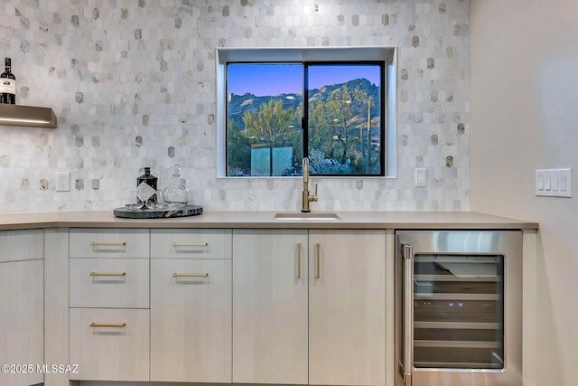 6800 N Cocopas Rd, Tucson, AZ 85718 - bar with wine cooler, a sink, and wallpapered walls