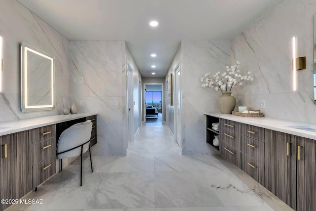 6800 N Cocopas Rd, Tucson, AZ 85718 - corridor with tile walls, light marble finish flooring, and recessed lighting