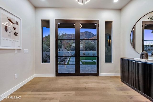 6800 N Cocopas Rd, Tucson, AZ 85718 - entryway featuring light wood-style flooring, baseboards, and recessed lighting
