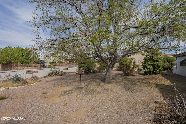 view of yard featuring fence