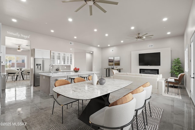 2891 N Wentworth Rd, Tucson, AZ 85749 - dining room with marble finish floor, visible vents, recessed lighting, and a ceiling fan