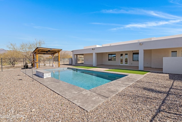 2891 N Wentworth Rd, Tucson, AZ 85749 - view of swimming pool featuring fence, a patio, french doors, and a fenced in pool
