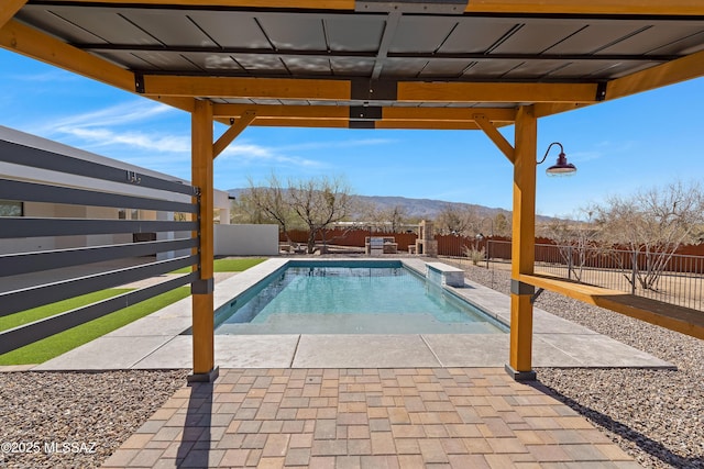 2891 N Wentworth Rd, Tucson, AZ 85749 - view of pool featuring a fenced in pool, a fenced backyard, a mountain view, and a patio area