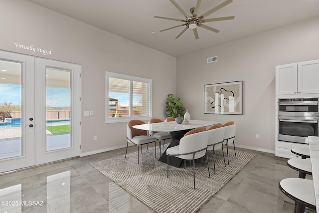 2891 N Wentworth Rd, Tucson, AZ 85749 - dining room with baseboards, visible vents, french doors, and a ceiling fan
