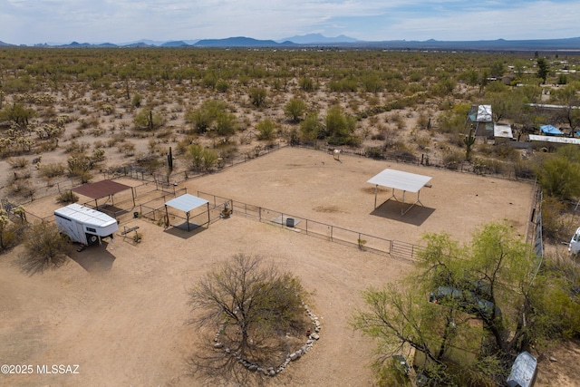 aerial view with a rural view, a mountain view, and view of desert