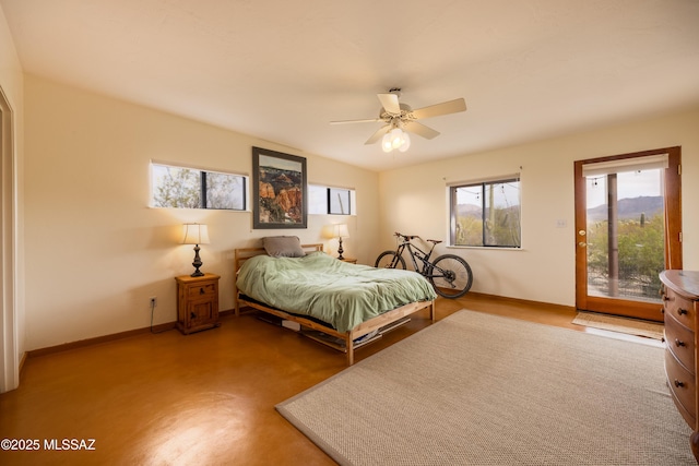 bedroom featuring access to exterior, baseboards, and a ceiling fan