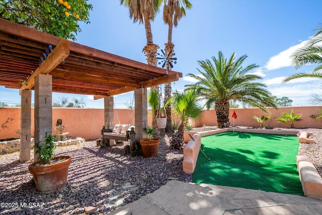 view of patio / terrace with a fenced backyard and a pergola