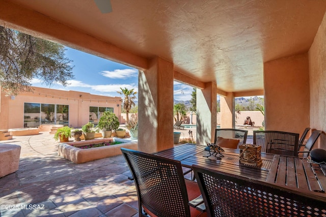 view of patio featuring outdoor dining space