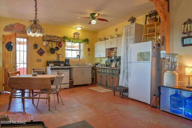 kitchen featuring a ceiling fan, open shelves, white appliances, pendant lighting, and white cabinetry
