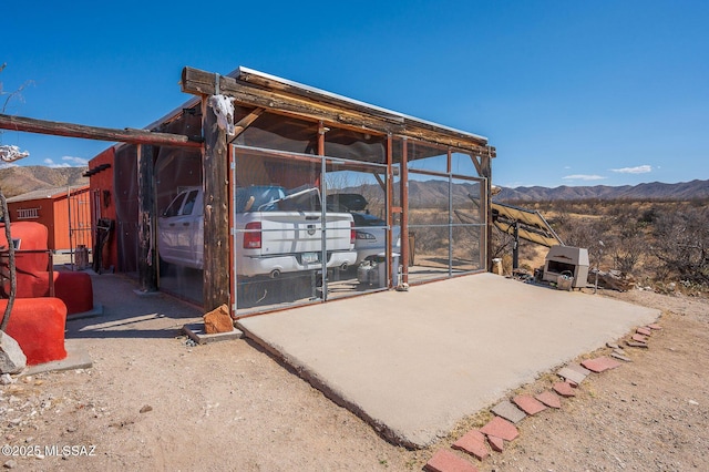 view of patio featuring a mountain view
