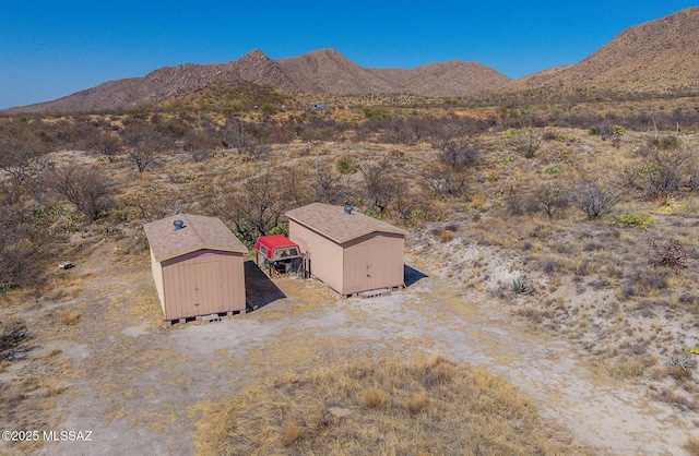 drone / aerial view with a mountain view and a desert view