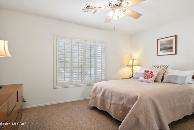 carpeted bedroom with baseboards and visible vents