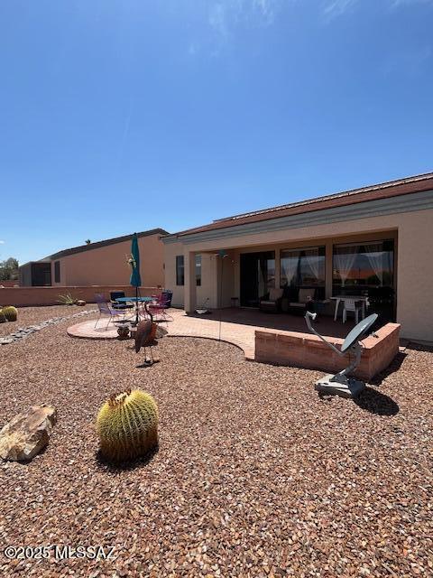 4769 S Meadow Ridge Dr, Green Valley, AZ 85622 - back of house featuring a patio