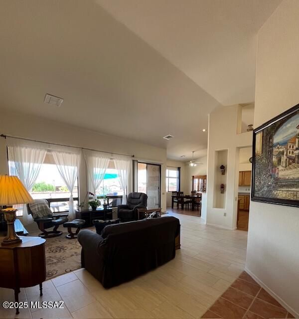 4769 S Meadow Ridge Dr, Green Valley, AZ 85622 - living area with baseboards and light tile patterned flooring