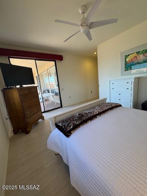 4769 S Meadow Ridge Dr, Green Valley, AZ 85622 - bedroom featuring access to exterior and ceiling fan