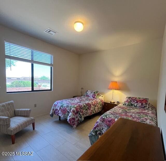 4769 S Meadow Ridge Dr, Green Valley, AZ 85622 - bedroom featuring light tile patterned flooring