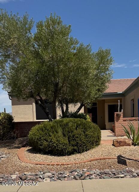 4769 S Meadow Ridge Dr, Green Valley, AZ 85622 - view of front of property with stucco siding