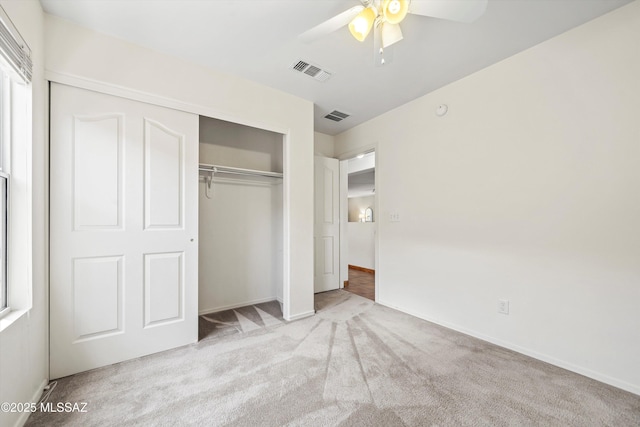 3398 W Sagebrush Hills Ct, Tucson, AZ 85741 - unfurnished bedroom featuring ceiling fan, carpet, a closet, and visible vents