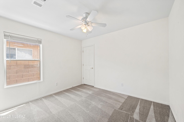 3398 W Sagebrush Hills Ct, Tucson, AZ 85741 - spare room featuring a ceiling fan, baseboards, visible vents, and carpet