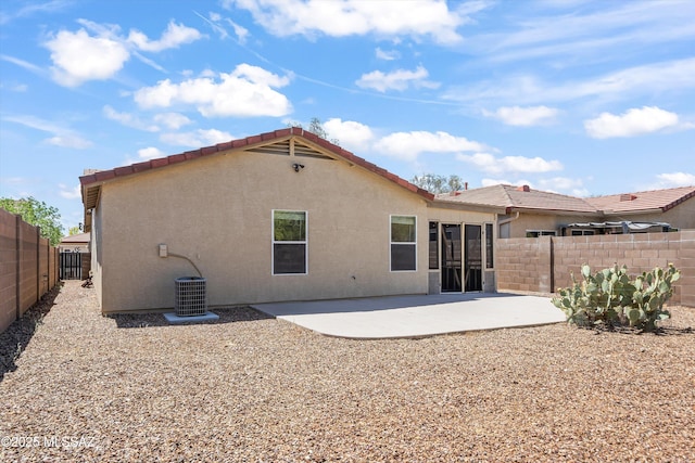 3398 W Sagebrush Hills Ct, Tucson, AZ 85741 - rear view of property featuring a fenced backyard, a patio area, stucco siding, and central AC unit