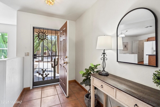 3398 W Sagebrush Hills Ct, Tucson, AZ 85741 - foyer with baseboards, a wealth of natural light, and visible vents