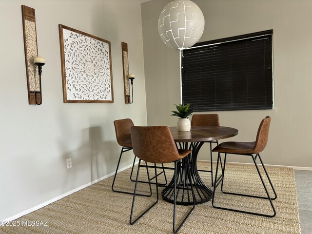 8754 W Denstone Rd, Marana, AZ 85653 - dining area featuring baseboards