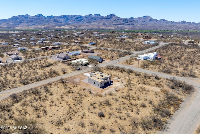 aerial view with a mountain view and view of desert