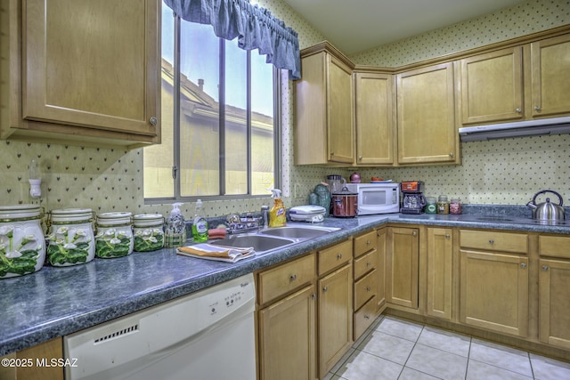 62583 E Amberwood Dr, Saddlebrooke, AZ 85739 - kitchen with plenty of natural light, white appliances, under cabinet range hood, and light tile patterned floors