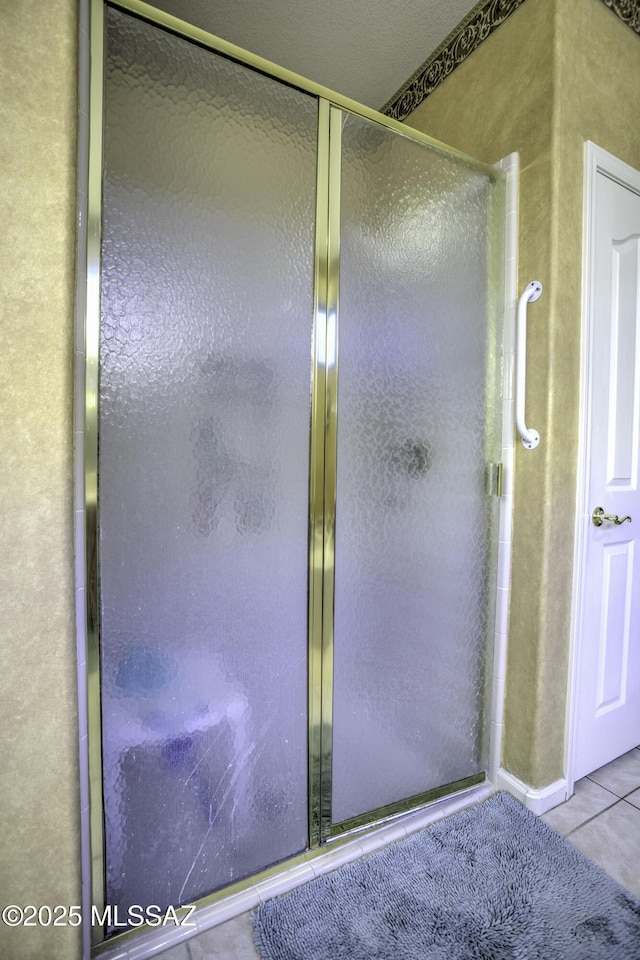 62583 E Amberwood Dr, Saddlebrooke, AZ 85739 - full bath featuring tile patterned flooring and a shower stall