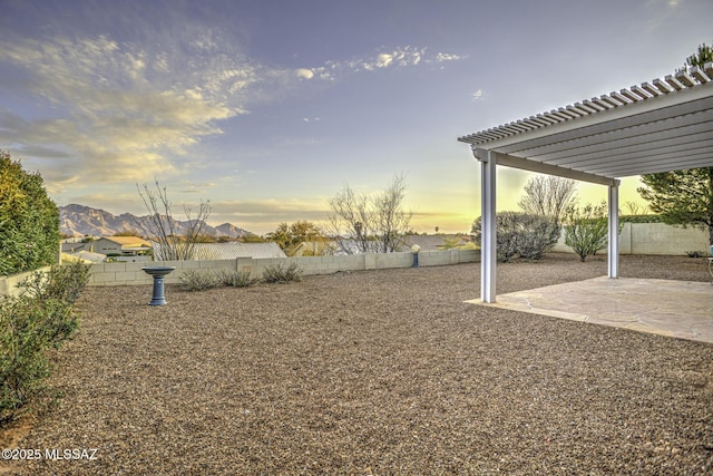 62583 E Amberwood Dr, Saddlebrooke, AZ 85739 - view of yard featuring a fenced backyard, a pergola, and a patio