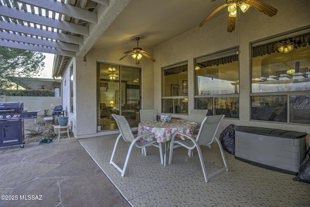62583 E Amberwood Dr, Saddlebrooke, AZ 85739 - view of patio / terrace featuring outdoor dining space, a pergola, fence, and ceiling fan