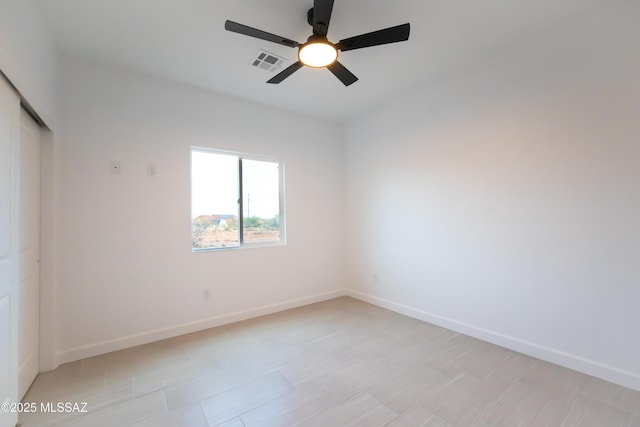 1686 Circulo Bahia, Rio Rico, AZ 85648 - spare room featuring a ceiling fan and baseboards