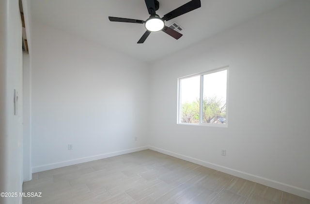 1686 Circulo Bahia, Rio Rico, AZ 85648 - spare room featuring ceiling fan and baseboards