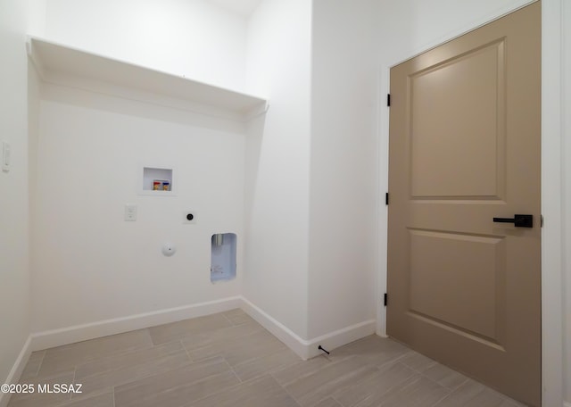 1686 Circulo Bahia, Rio Rico, AZ 85648 - washroom featuring electric dryer hookup, washer hookup, baseboards, and gas dryer hookup