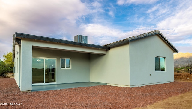 1686 Circulo Bahia, Rio Rico, AZ 85648 - rear view of property featuring a patio area, stucco siding, and central air condition unit