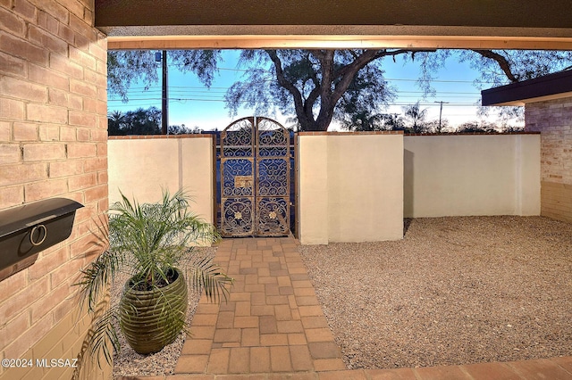 340 S Country Club Rd, Tucson, AZ 85716 - view of patio featuring a gate and fence