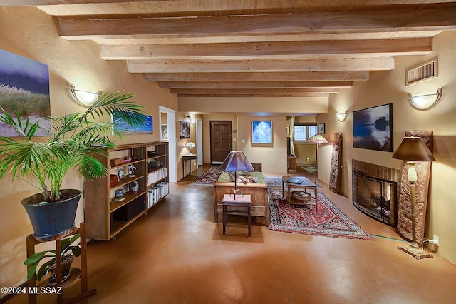 340 S Country Club Rd, Tucson, AZ 85716 - living room featuring finished concrete flooring, a fireplace, visible vents, and beam ceiling