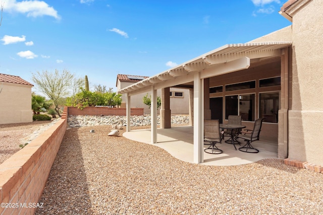 view of yard featuring a patio and fence