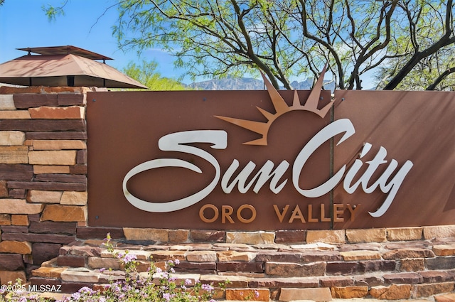view of community sign