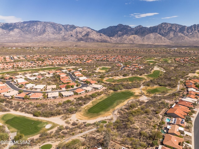 birds eye view of property featuring golf course view and a mountain view