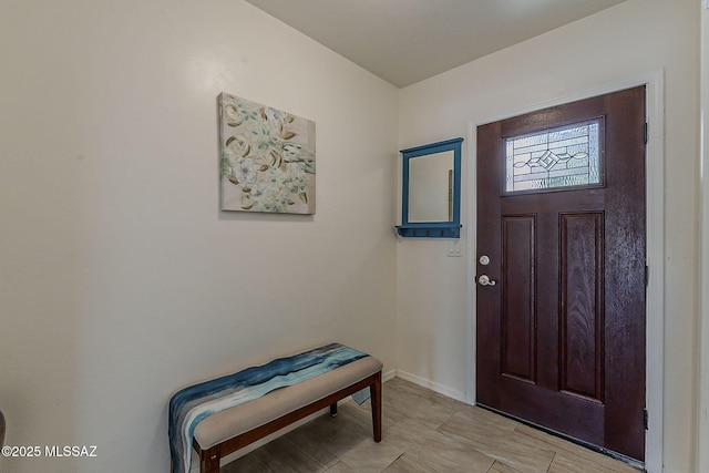 entrance foyer featuring baseboards