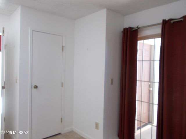 interior space with baseboards