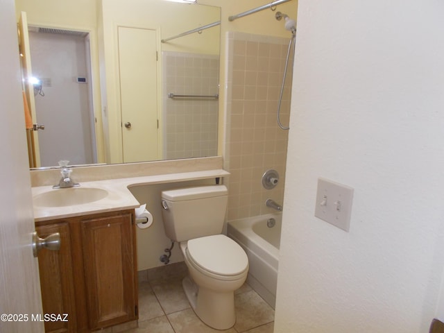 full bath featuring vanity, tile patterned flooring, tub / shower combination, and toilet