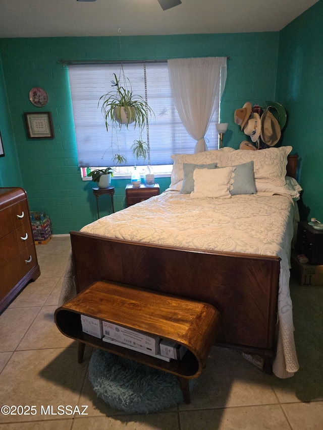 bedroom featuring light tile patterned floors